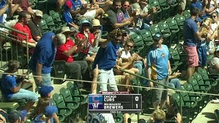 CHC@MIL: Cubs fan snares a foul ball behind the plate