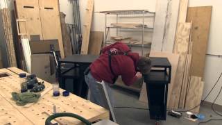 Ron continues in part 9 of a 10 part video series on building his standup desk. Installing the drawer. Paulk Workbench Plans: http://