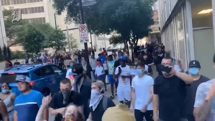 Protesters stop traffic on Woodall Rodgers Freeway...