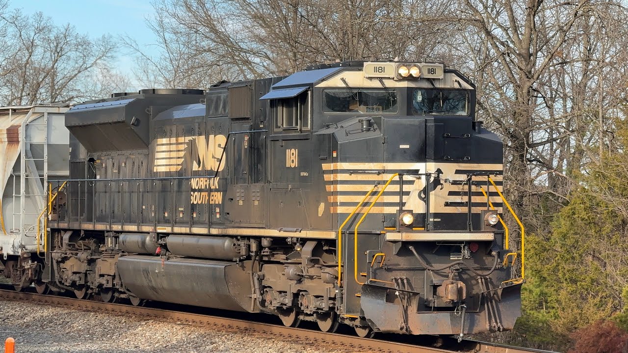 NS SD70ACE #1181 leads 13R through Manassas, VA with AC44C6M #4630 as rear DPU on 02:21:26