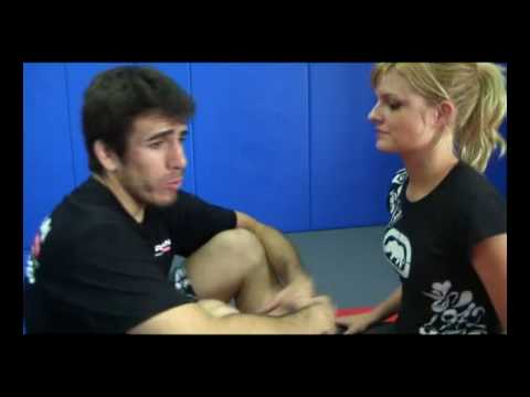 UFC fighter Kenny Florian shows a guillotine choke variation using a rear naked choke grip on Joanne of MMA Girls