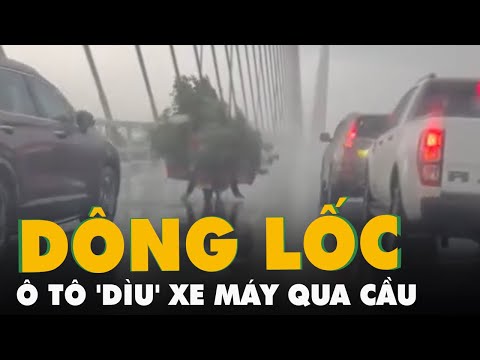 Video Nhiều tài xế ô tô 'dìu' xe máy qua cầu Bãi Cháy trong... - youtube