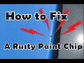 How to fix a rusty rock chip in car paint