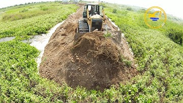 Shacman Dump Trucks Unloading Soil And Shantui SD22S Bulldozer Pushing Soil Building New Road