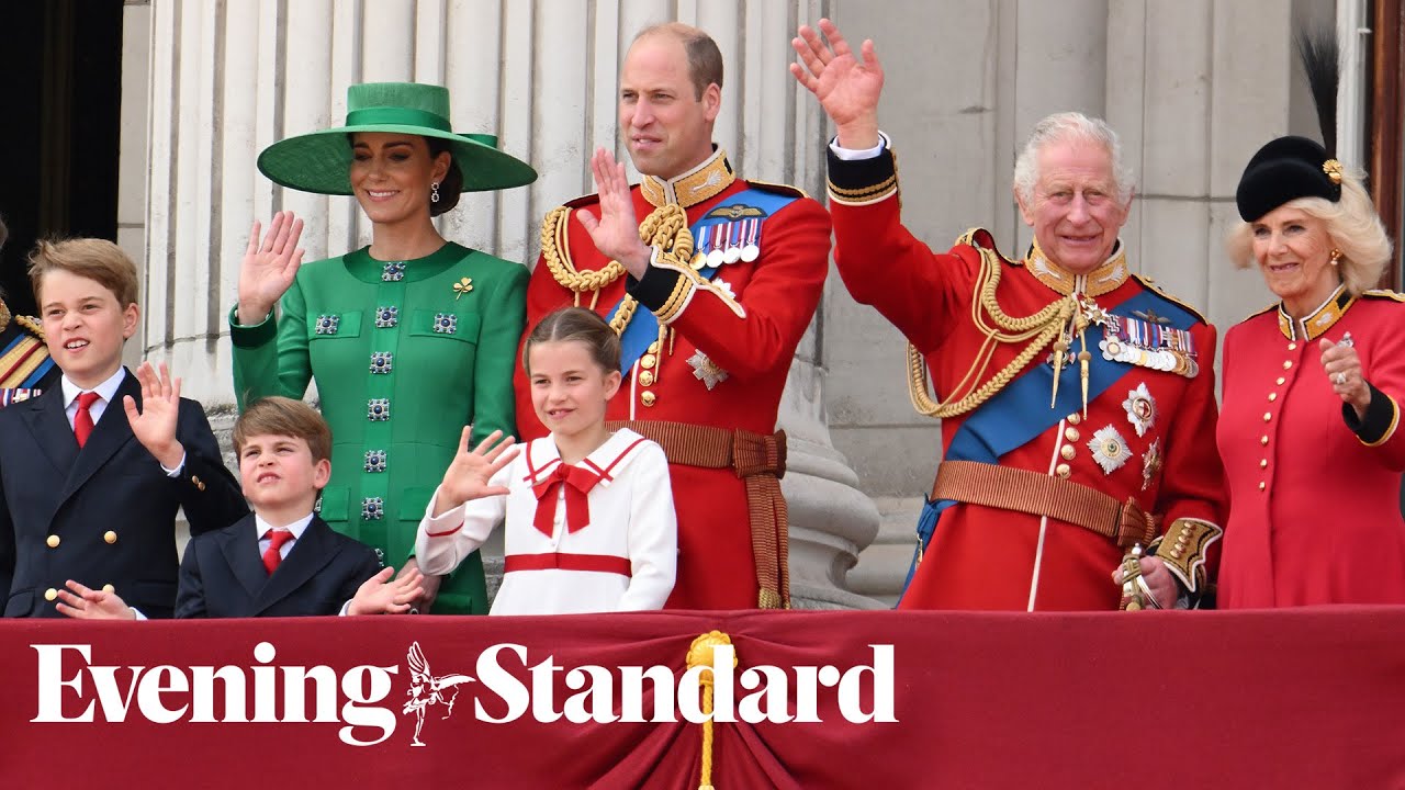 King thanks Trooping crowds from palace balcony as Prince Louis plays up