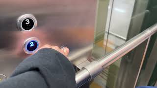 Kone EcoDisc MRL Traction Glass Elevator to Tram at Capital PEK Airport in Beijing, China