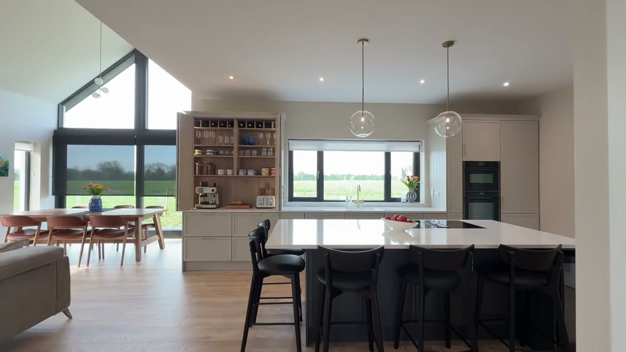 48 Collection -  Slim Solid Shaker door painted in Cashmere with the Island painted in Graphite