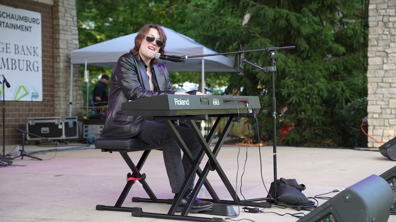 Robbie performing "Hey Jude" at Septemberfest in Schuamburg, IL. on August  30, 2025