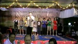 Family Appreciation Day 2009 - Tony Ng with SJSDS children sang 'Ehipassiko'