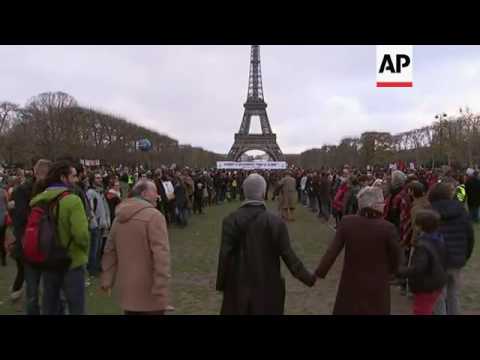 Raw: Paris Protesters Denounce Climate Accord