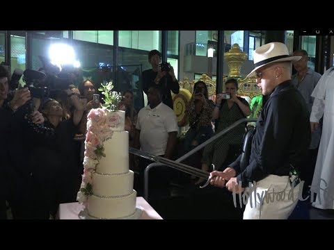 Jake Paul Cuts Wedding Cake With Giant Sword After Marrying Tana Mongeau