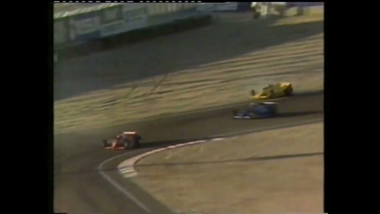 Mario Andretti and John Paul, Jr. collide at 1984 Caesar's Palace GP IV (Indycar)