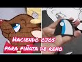 Haciendo ojos para piñata de reno navideño