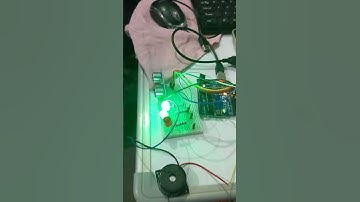 SMART REVERSE CAR PARKING SYSTEM USING ARDUINO UNO.