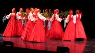 BERIOZKA - Russian dance performers appear to be floating across the stage.