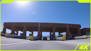 Wide Open Desert Highway Drive Nevada Flatlands Under Bright Midday Sun