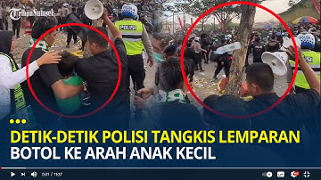 Detik-detik Polisi Tangkis Lemparan Botol ke Arah Anak Kecil Saat Laga Persebaya Vs Persija