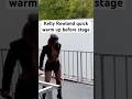 Kelly Rowland stretches before going on stage