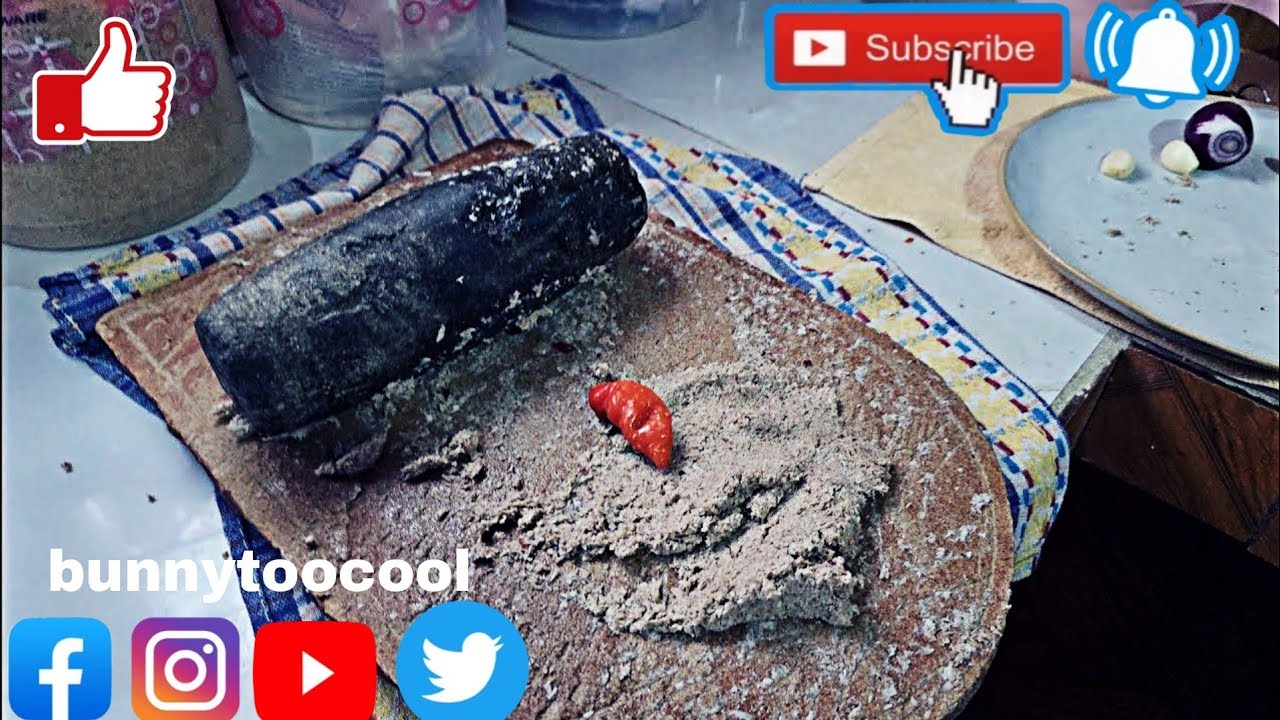 making smoked Herring dhal rice and coconut choka by my mom house