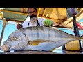 Huge golden trevally fish cutting skills