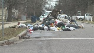 Fire forces trash truck to dump trash in middle of the street on N. 26th Street