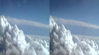 3D! - Airplane window and clouds