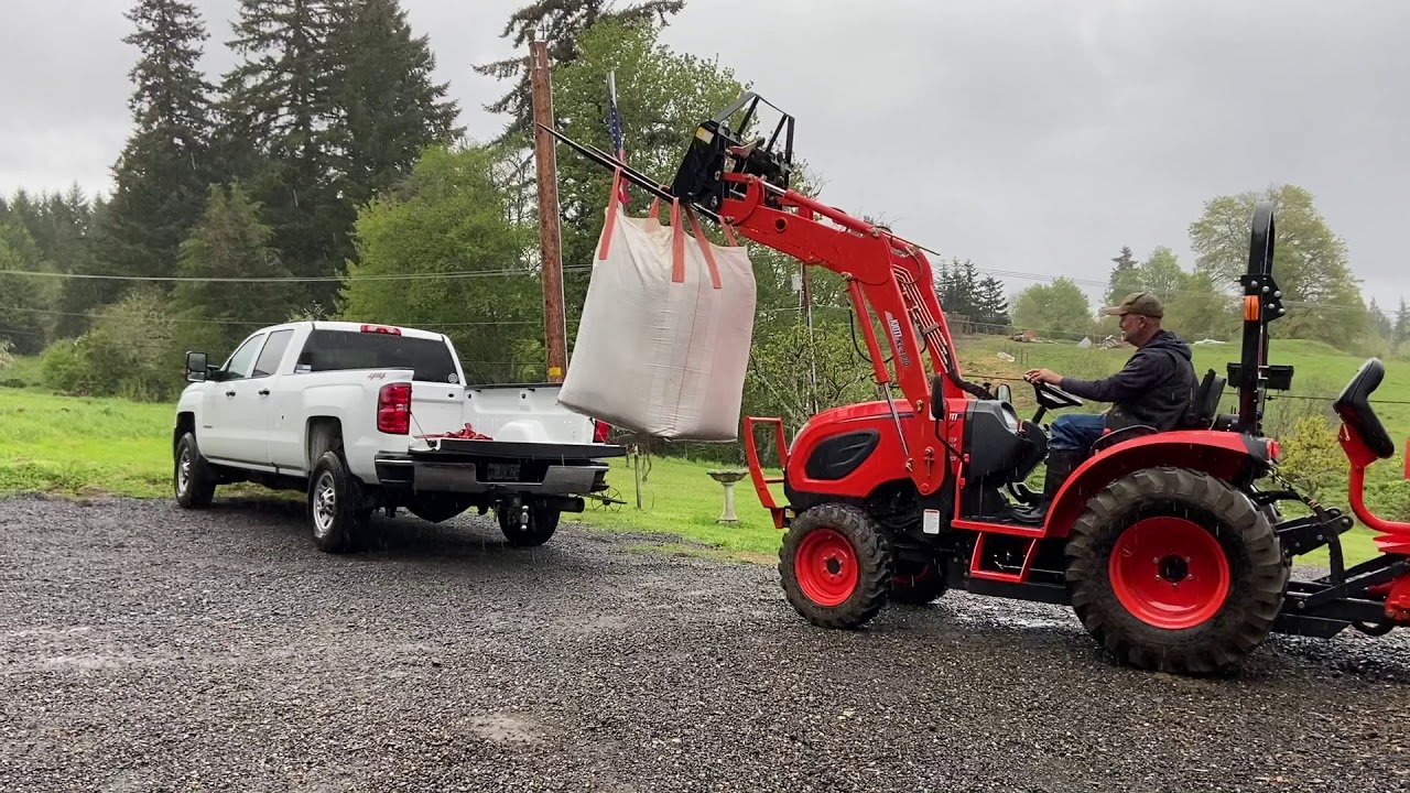 67 Kioti Tractor with Titan Pallet Forks! We got a lot of saw dust