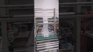 Full automatic C fold type roll garbage bag making machine