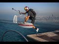 Brian grubb  drone wakeskating on dubai skyscrapers infinity pool and base jumping