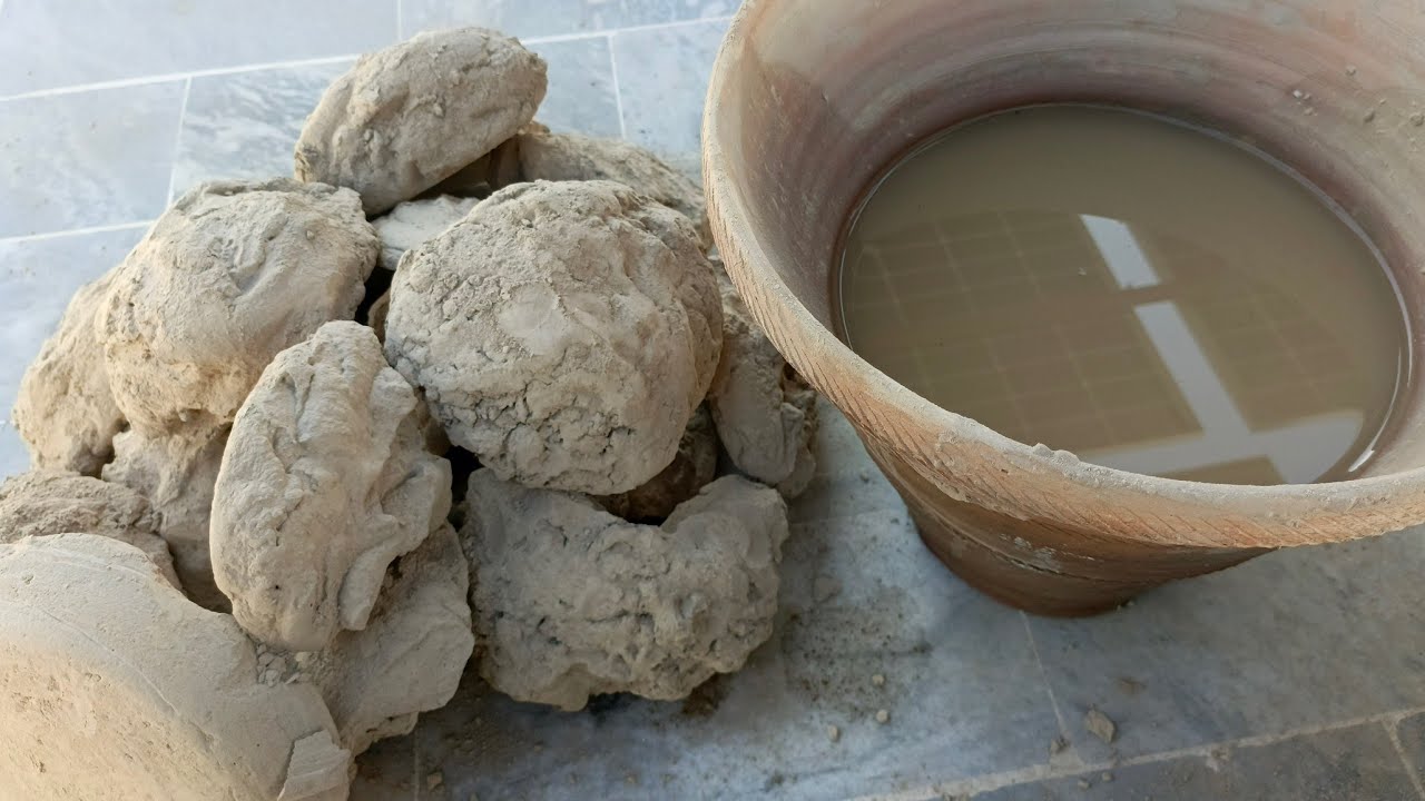 Asmr. Bombastic white mud water crumbling in big clay pot 