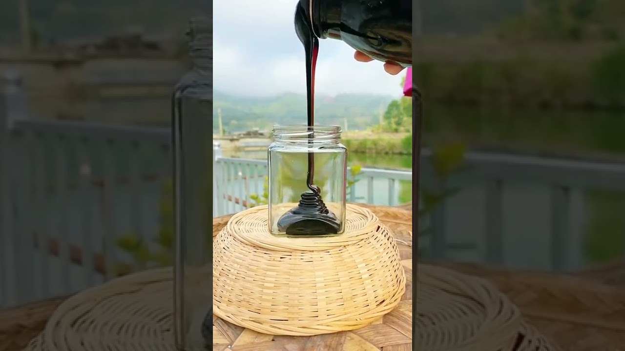 Add black honey to jar
