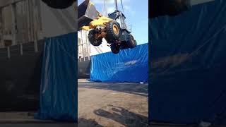Lifting whelloader into the ship Lifting whelloader into the ship