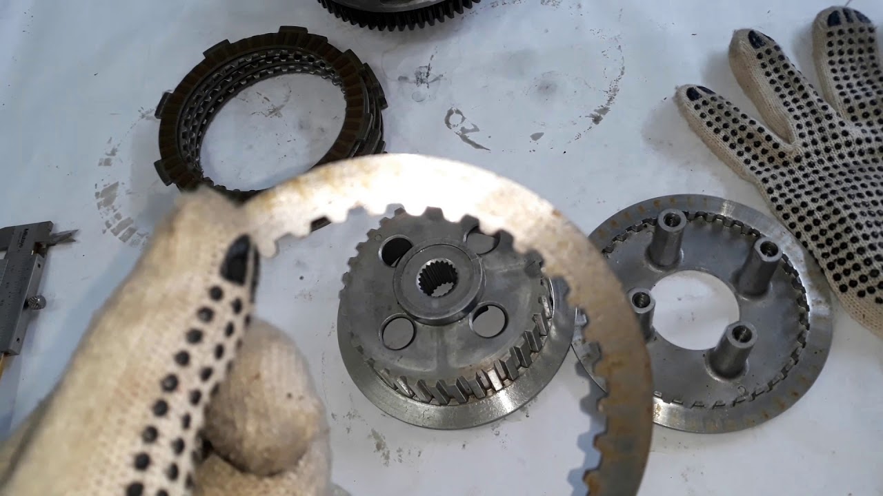 Muita atenção na montagem do conjunto de embreagem motor 150 Honda.