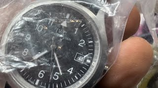 “IWC wristwatch” found thrift store, junk bag FAKE or REAL??