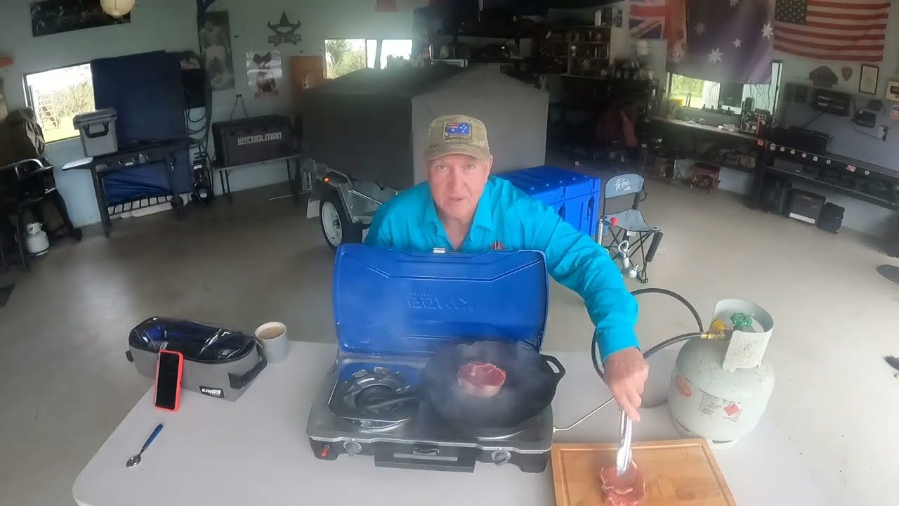 Cup of coffee and some Rib Fillets on the Adventure Kings Two Burner Stove 