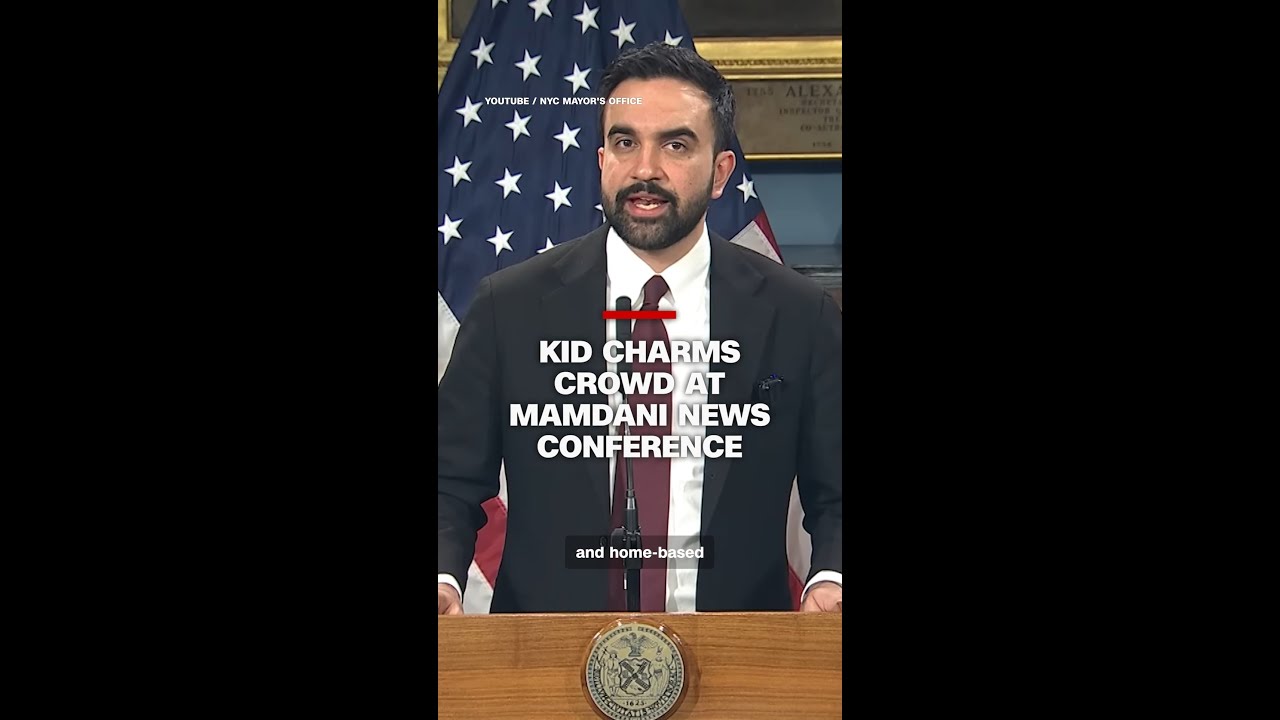 Kid charms crowd at Mamdani news conference