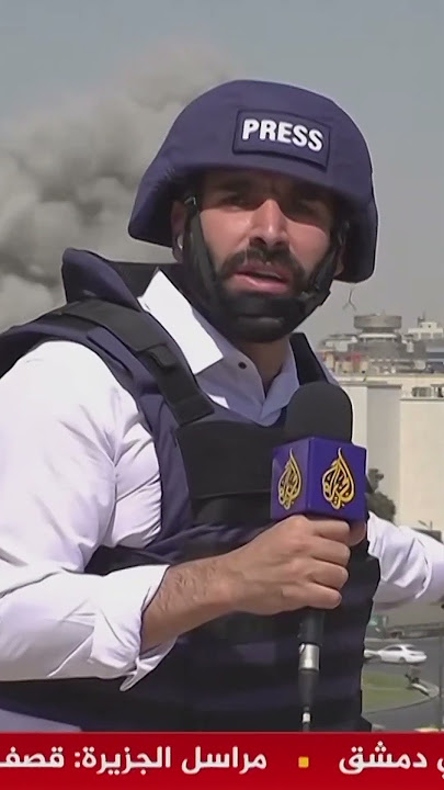 Al Jazeera reporter ducks as missile strikes Damascus
