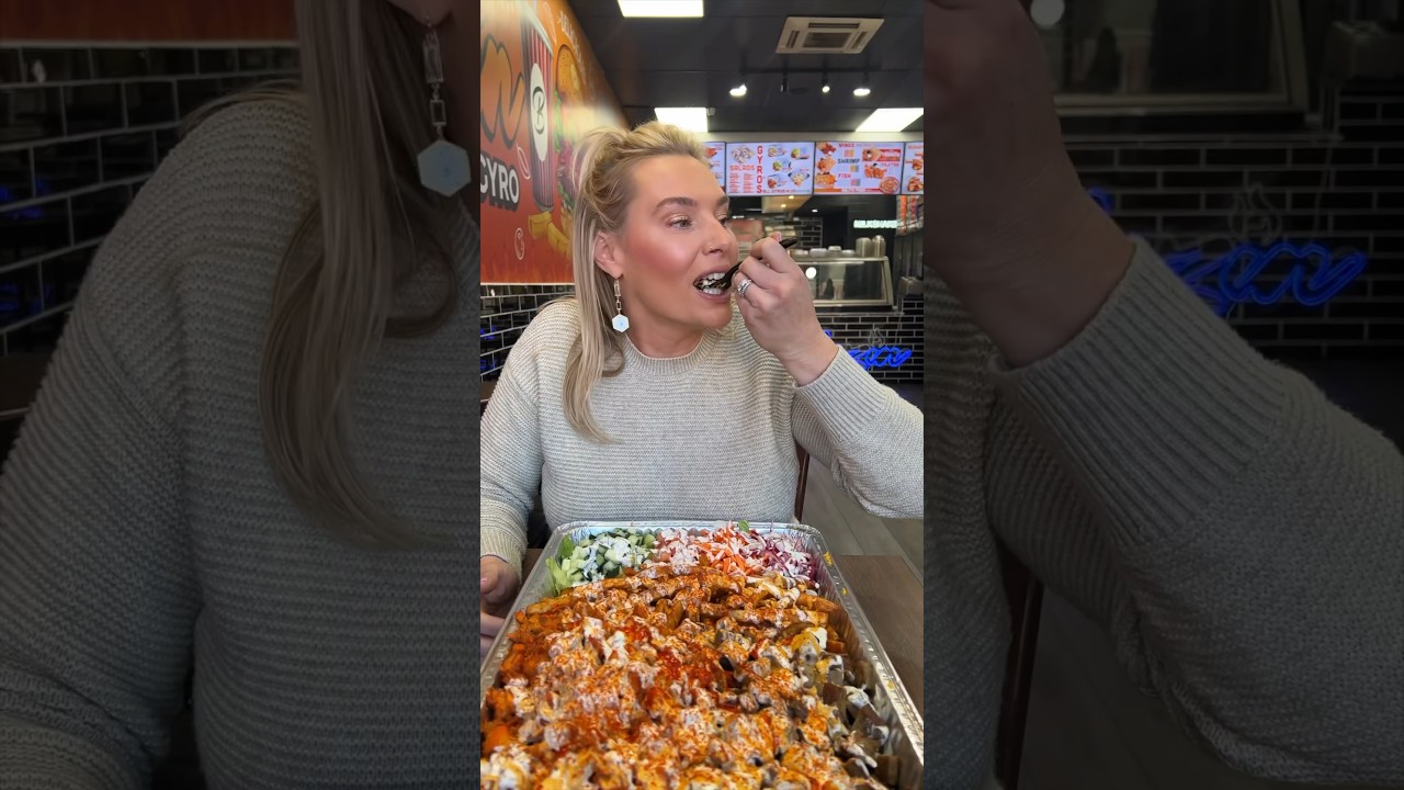 The GIANT HALAL PLATTER in tbe making from Blazin Chicken & Gyro in North Bergen, NJ! #DEVOURPOWER