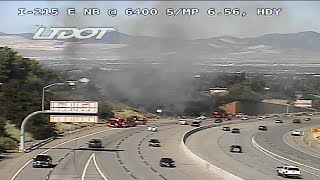 Brush fire sparks off of I-215 Holladay