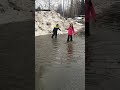 Crazy sister and her friend in big puddle...