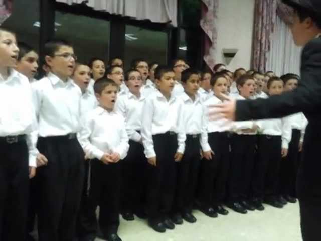 Elisha Klatzko (age 15) conducting his Choir acapella