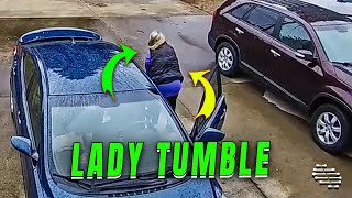 Lady's Random Tumble While Getting Out of the Car