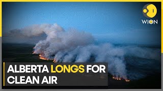 Alberta wildfire fighters hope rain, cooling bring relief | English News | WION Climate Tracker