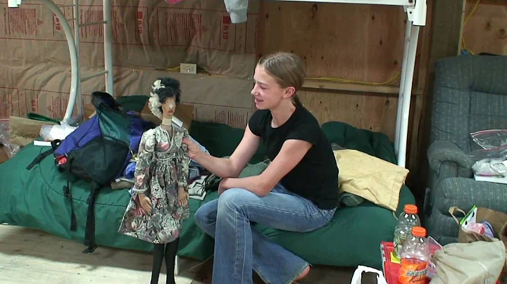 Andrea Dinsmore Gives a Doll to Scrambler