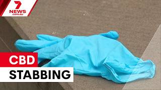 Mother allegedly stabbed protecting son in Melbourne CBD attack | 7NEWS