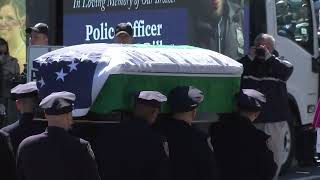 Procession walks NYPD Officer Diller's casket into church