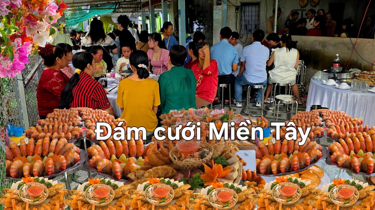 Đám cưới ngày tết họ hàng đông vui Cô dâu chú rể đẹp đôi.CTMT 