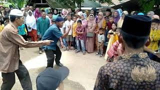 Pencak silat asli adat Melayu Jambi yg diadakan saat acara menyambut pengantin