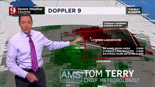 Possible Tornado Damages Homes and Damages Power Lines, Trees