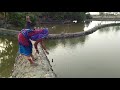 Cast net fishing/Traditional  catching  fish with a cast net by beautiful women.part:125